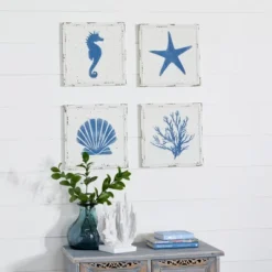 Set Of 4 Metal Sea Horse Speckled Wall Decors With Starfish Shell And Coral Designs Cream - Olivia & May -Home Decor Shop GUEST 224fcb19 35d1 42ea a972 f7e9e12e0abb